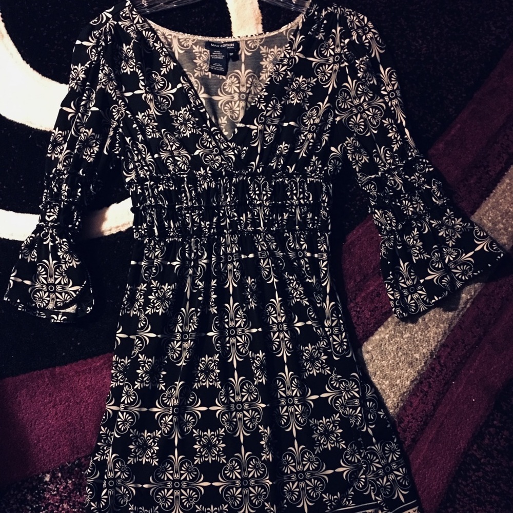 Cute stylish dress empire waist very comfortable.